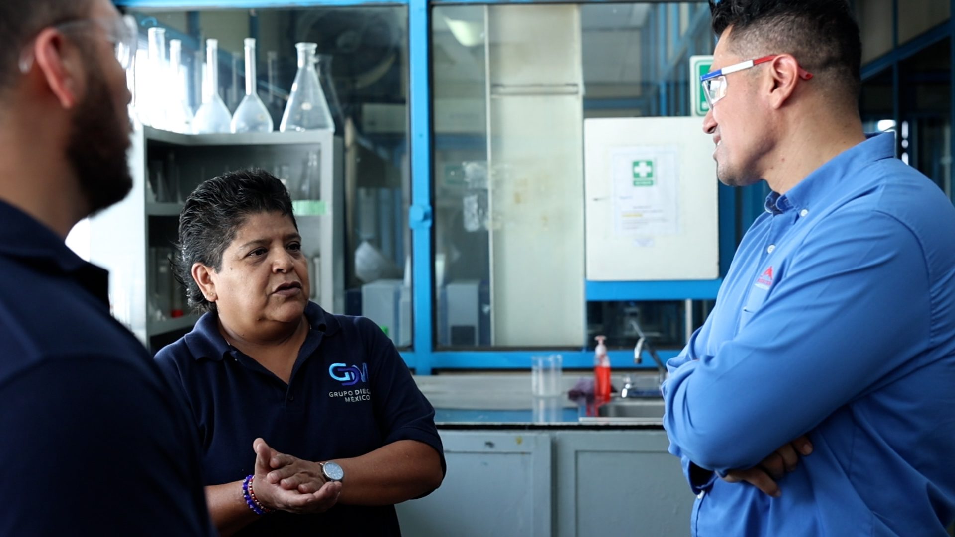 Redstone quality staff in discussion inside a facility quality lab